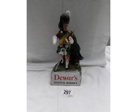 An old and rare Dewar's Scotch whisky figure