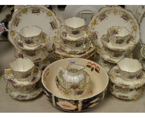 A late Victorian Melba china tea service for twelve; an Imari bowl