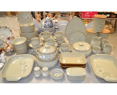 A Denby Daybreak pattern dinner and tea service, cups and saucers, dinner plates, serving plates, storage jars and covers, ve