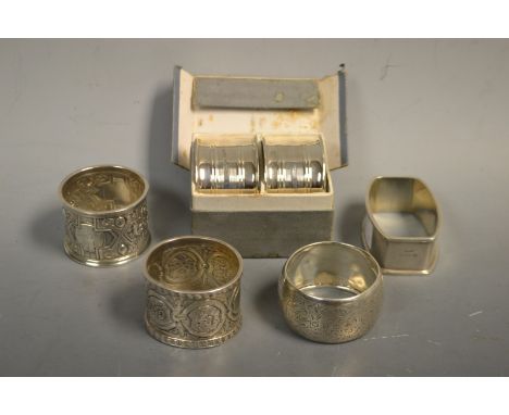 A pair of silver napkin rings, engine turned, Birmingham 1930; other Victorian and later silver napkin rings, 4oz (6)