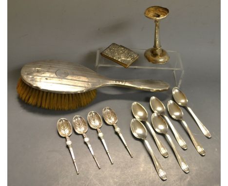 A set of four silver anointing spoons, Birmingham, 1910; a set of six silver teaspoons; a silver backed hand mirror; etc