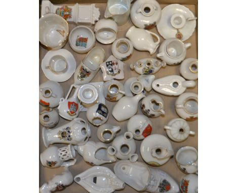 Crested China - a W H Goss model of an Ancient Egyptian Lamp found at Bournemouth, matching crest; a Willow Art elephant; a R