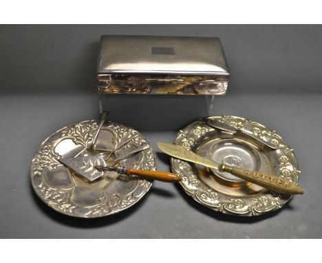 A silver circular dish set with a central coin, probably sterling; a silver mustard spoon, a silver salt spoon; an EPNS cigar