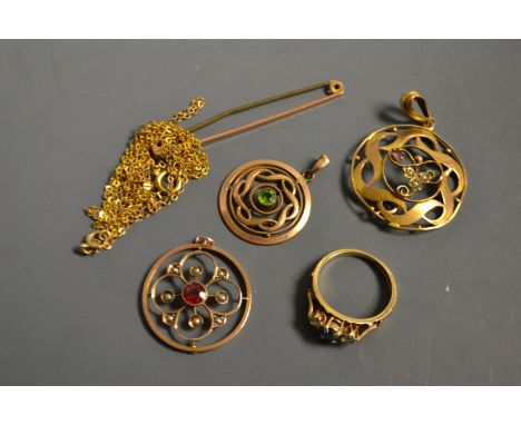 An Edwardian 9ct gold amethyst and seed pearl pendant; two other similar pendants; a 9ct gold ring set with blue and white st