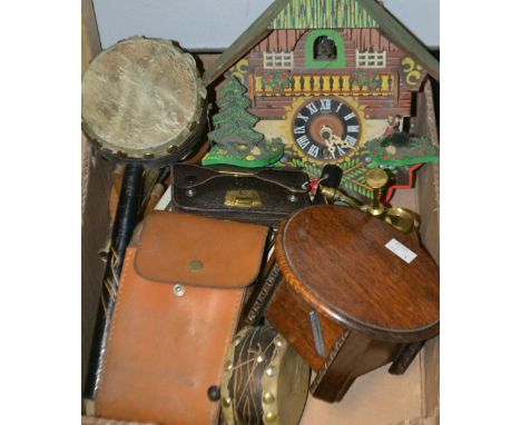 A cuckoo clock; a novelty miniature oak musical jewellery box; a novelty pistol cigarette lighter on stand; a Westclox alarm 