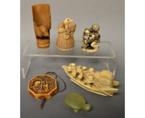 A faux ivory model, of a Chinese boat; an octagonal toggle, etc.; a jade coloured turtle (6)