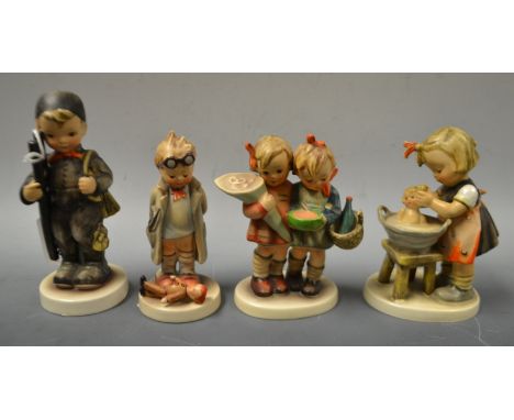 A Hummel figure the Chimney sweep ,another, doll bath, others ( 4 )