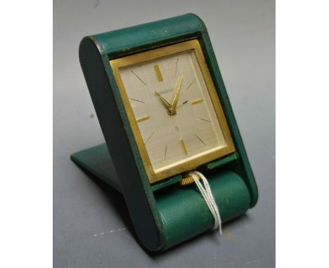 An Art-Deco style Jaeger le Coultre travelling desk alarm clock, 4.5cm rectangular silvered dial with gilt baton chapter and 