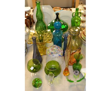 A Mdina glass cylindrical decanter, globular stopper; an opaque glass lamp shade; a novelty glass thistle; green glass bottle