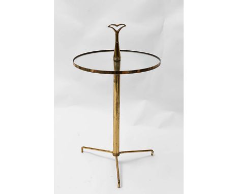 A GILT OCCASIONAL TABLE, ITALIAN 1960s, with circular glass top, on tripod base 70cm (h) x 30cm (dia)