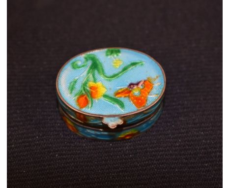 A silver and enamel Art Nouveau oval pill box