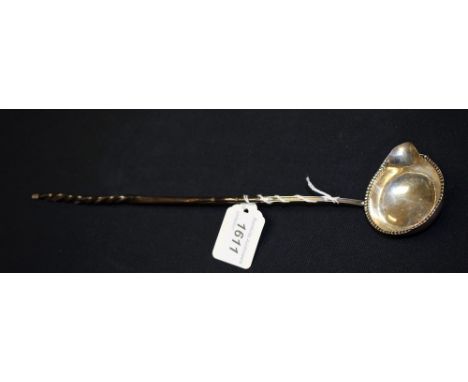 A George III silver toddy ladle, baleen handle, London 1767