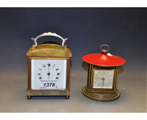 An mid 20th century Mappin & Webb onyx carriage clock, bevelled glass panels, folding handle; another, 1950s Arla lantern clo