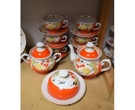 Ceramics - a Ukranian tea service, vivid orange berry design on white ground, comprising six cups and saucers, tea pot, sucri