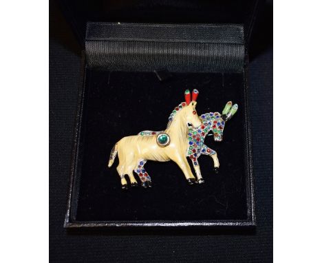 An enamel and paste horse brooch