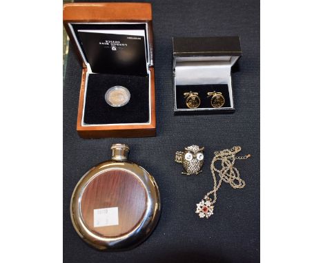 Gilt metal St. George & Dragon cufflinks, baton fastening in box of issue, silver plated circular hip flask with timber effec