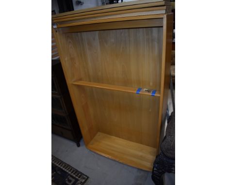 A modern Ercol light ash bookcase, 3841, very clean and tidy with just an odd mark on the top, see additional pics
All shelve