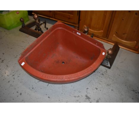 A vintage cast iron (later painted) corner trough or sink, Musgraves, Belfast