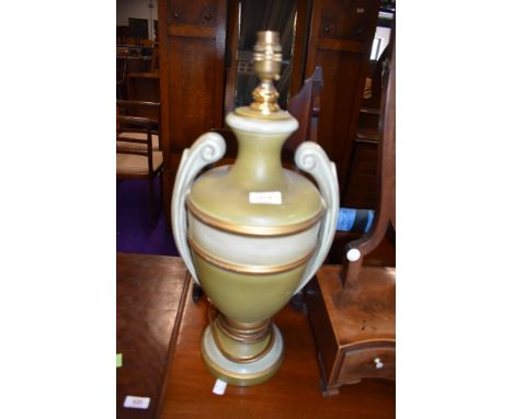 A reproduction urn style table lamp