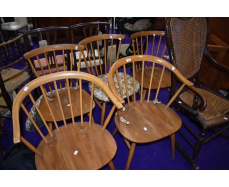 Five (three plus two) Ercol light stain beech spindle back kitchen chairs