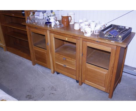 A light oak sideboard 