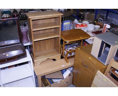 A good quality light oak, open fronted bookcase, a magazine rack and a coffee table 