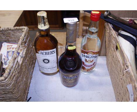 A bottle of Martell Cognac, bottle of Teacher's Scotch whisky and a bottle of vodka
