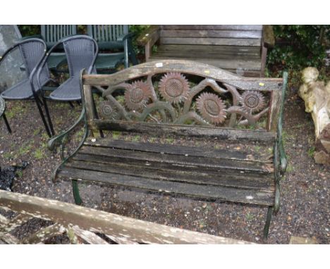 A wooden and metal garden bench