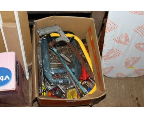 A box of various hand tools