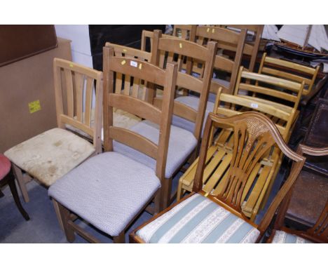 Four modern ladder back dining chairs