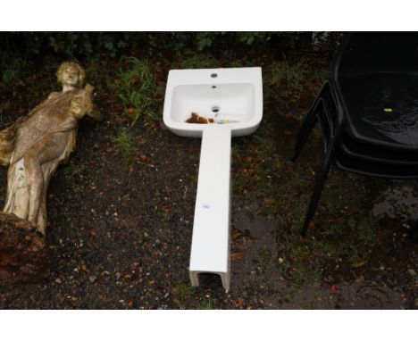 A hand basin on pedestal