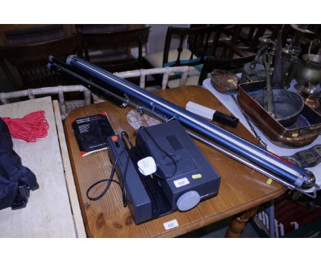 A Reflecta projector screen and accessories 