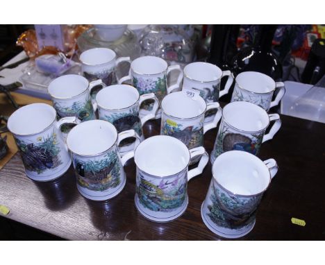 A set of twelve Hammersley bone china bird mugs decorated by M J Pledger