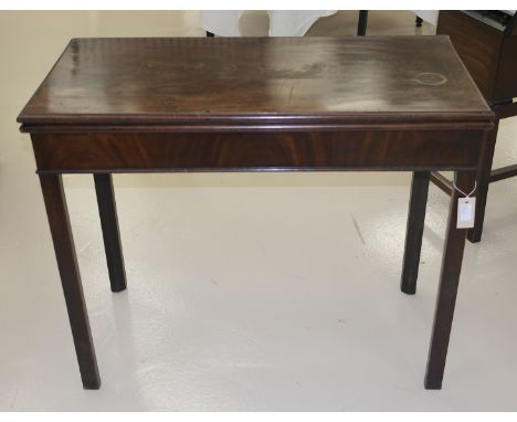 A Card Table:
George III mahogany with fold out leg of plain form on square legs H73cm x 90cm  x 90cm