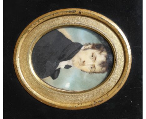 Circle of Richard Cosway, R.A. (1742-1821):
A portrait miniature of a gentleman in a black jacket & white cravat, inscribed &