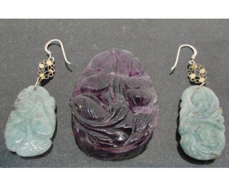 A Pair of Jade Earrings and a Carved Amethyst Pendant:
two jade items, one with gourds, the other of peaches, mounted as earr