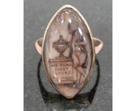 A Georgian Remembrance Ring:
in an unhallmarked gold mount,the navette shaped ring with a monochrome painting of a man next t