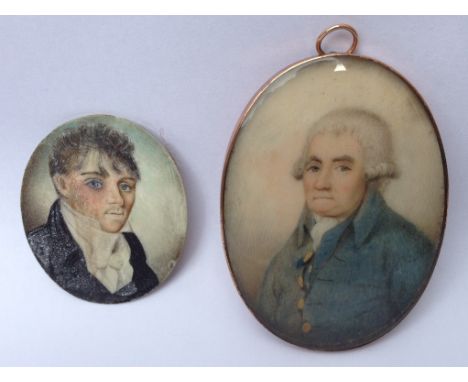 Circle of John Bogle (British, 1746-1804):
A portrait miniature of a gentleman in a blue jacket, H 6.5 cm; together with a sm