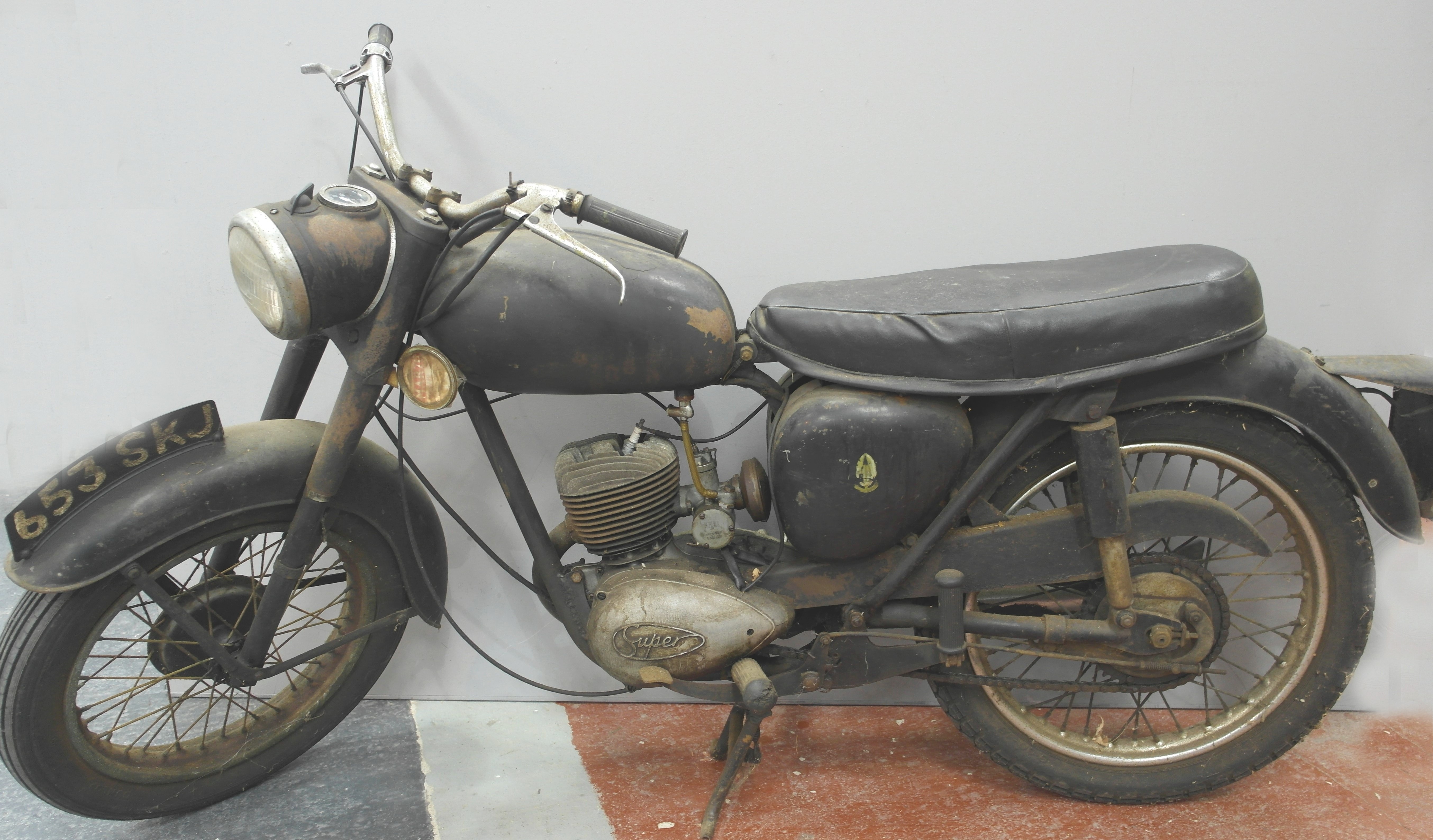 A 1960s BSA Bantam D7 Super 125cc, twostroke motorbike, last used on