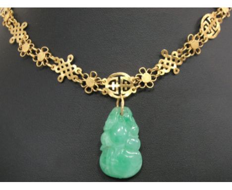 A 19th Century Chinese Necklace and Jade Pendant:
filigree link chain with Chinese symbols and flowers with jade gourd carved