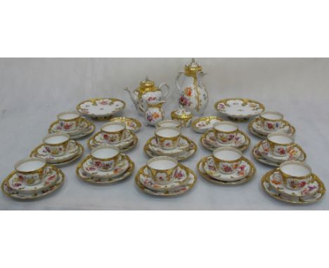 A 19th Century KPM Part Dinner Service:
Handpainted floral and gilt part tea service comprising Tea and coffee pot,sucrier,cr