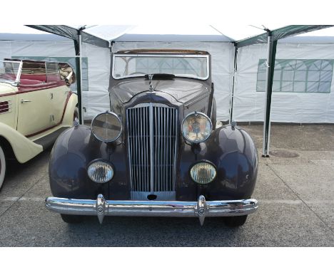 A 1936 Packard Right Hand Drive Light Brown & Grey Convertible
 