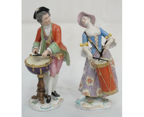 A 19th Century pair of Samson Drummer Figures:
A man and woman in period dress, the man playing a kettle drum, the woman wear