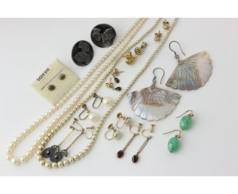 Eleven various pairs of earrings, a cultured pearl necklace, and an imitation pearl necklace