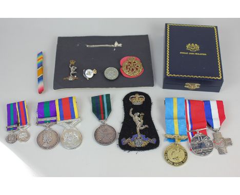 A medal group awarded to Cpl R W Livermore Royal Signals 23201886, including a General Service medal, Victory reverse, Malaya