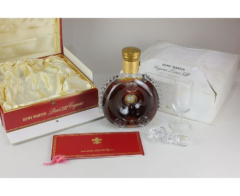 A Remy Martin Louis XIII Grande Champagne cognac, in Baccarat crystal decanter with fleur-di-lis stopper, in presentation cas