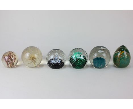 Two Caithness glass paperweights, 'Starlight' and 'Cauldron', a Louis Thompson paperweight, two Hafod Grange paperweights, an