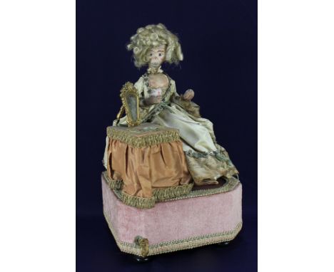 A 19th / early 20th century monkey musical automaton dressed in a lace trimmed gown with Christian Dior Colifichets label, 39