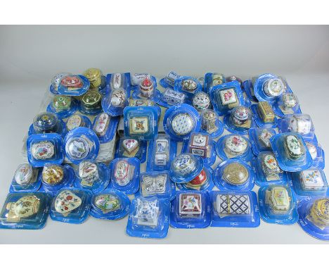 A collection of approximately sixty Del Prado porcelain trinket/pill boxes in various shapes and styles, most with gilt faste