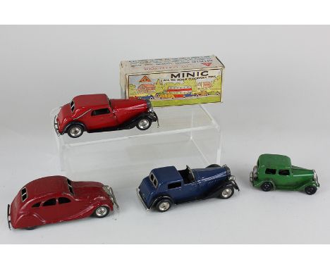 Four Tri-ang Minic clockwork model motor vehicles, comprising a Vauxhall Town Coupe car, in red (boxed), a Vauxhall Cabriolet